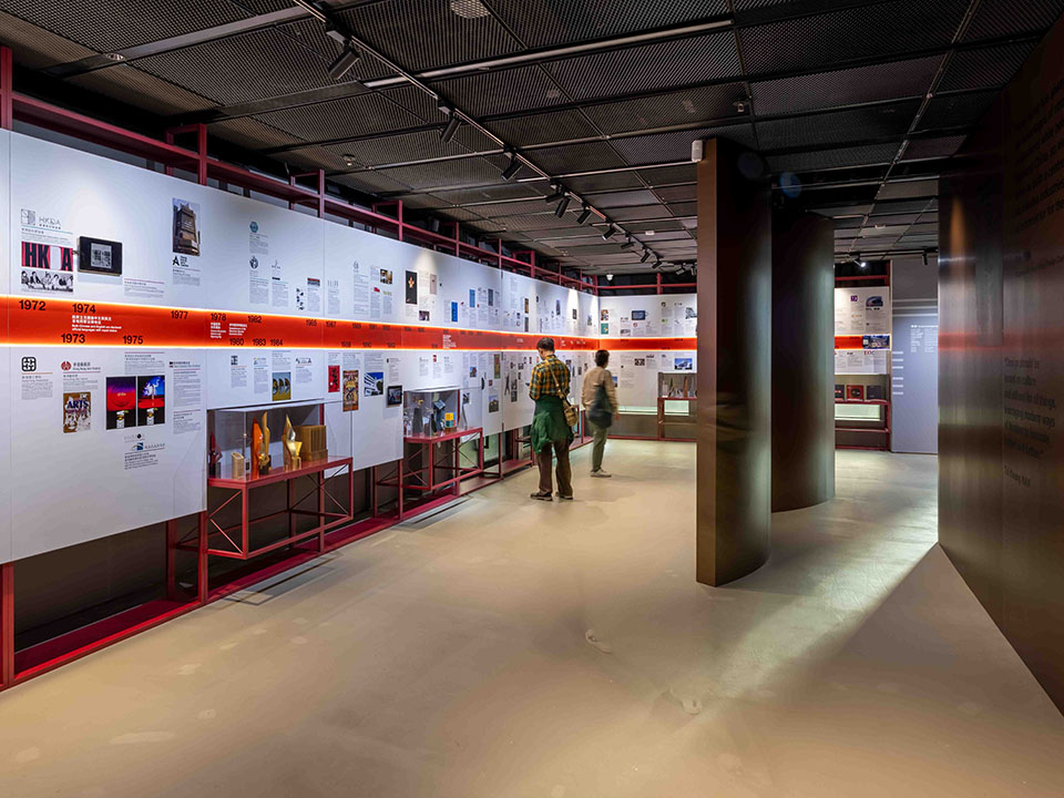 A large, bright room hosting the 'Hong Kong Design Ecology' exhibition and Hall of Fame.