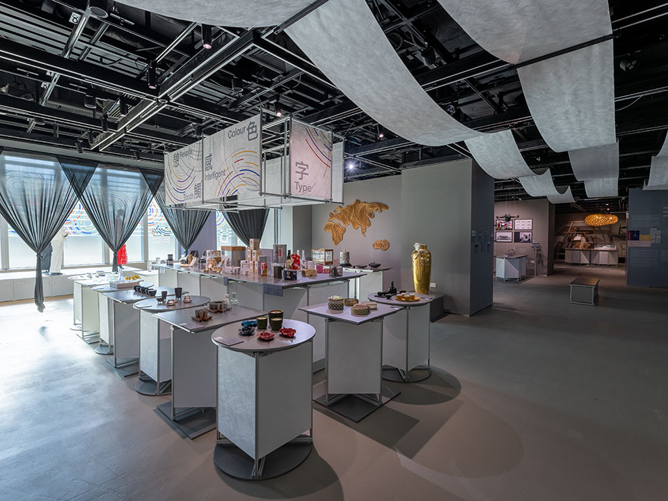 A vibrant space showcasing shelves and tables filled with unique designs, reflecting Hong Kong's rich design heritage.