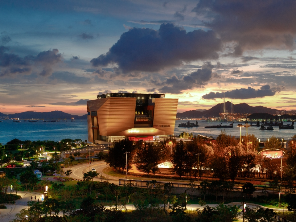 Hong Kong Palace Museum set against Victoria Harbour.