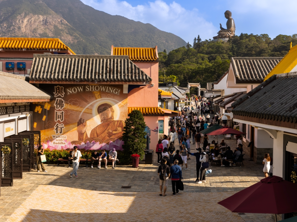 Crowds of people walking in Ngong Ping Village