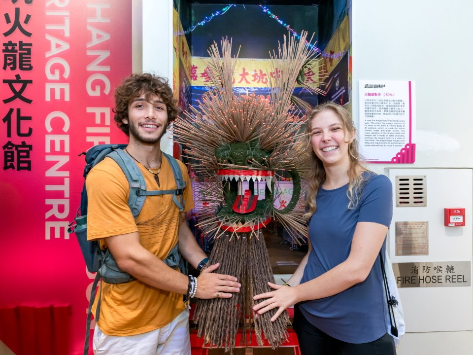  A couple poses with displays at the Tai Hang Fire Dragon Heritage Centre.