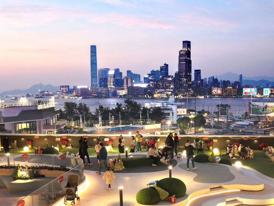 A view of wwwtc mall from L5 Victoria Sky Park, showcasing the scenic city skyline at sunset.