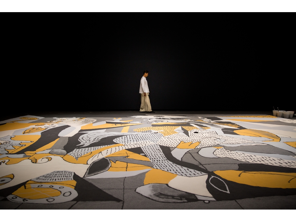 -hero-image-lee-mingwei_guernica-in-sand_3_1024_white-0227093113
