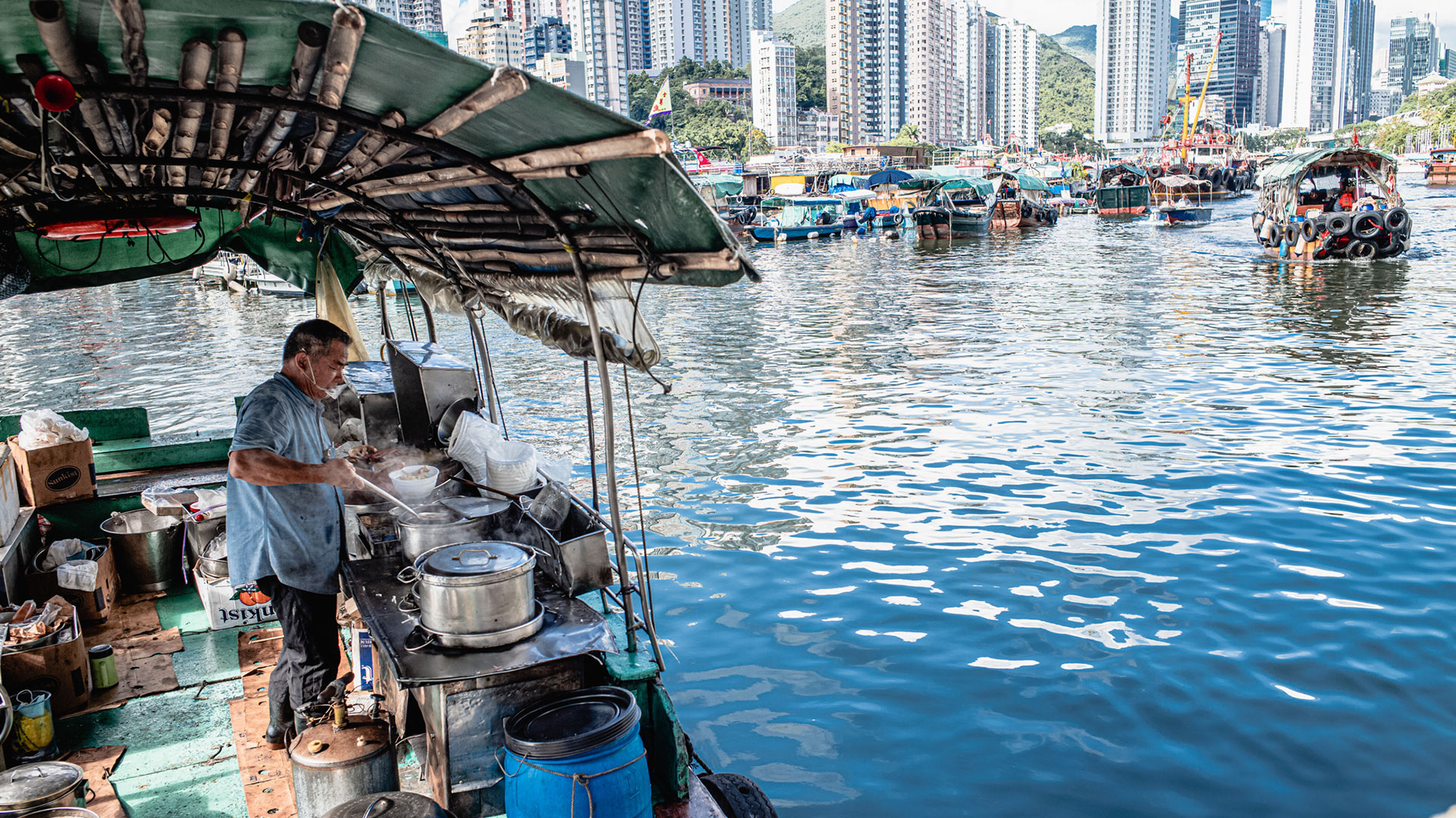 A fishman is cooking in the ship
