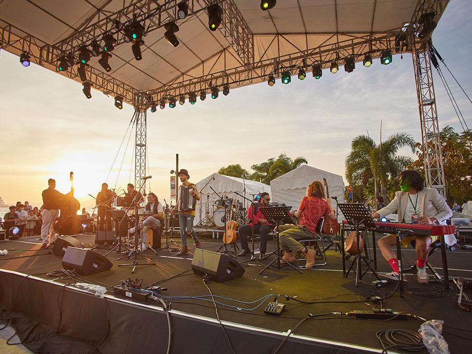 Visitors enjoying jazz performances at the outdoor Freespace Jazz Fest in West Kowloon Cultural District.