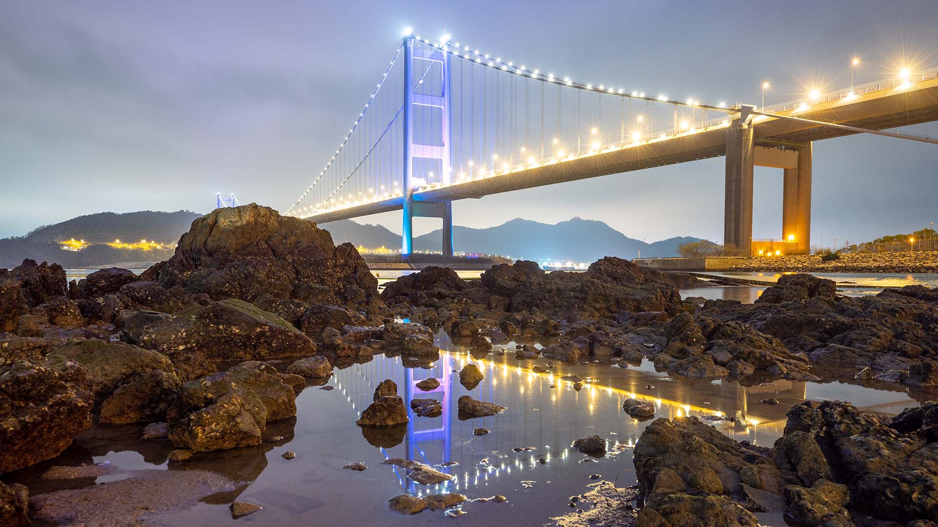 Magnificent view of the Tsing Ma Bridge from Ma Wan Tung Wan Beach