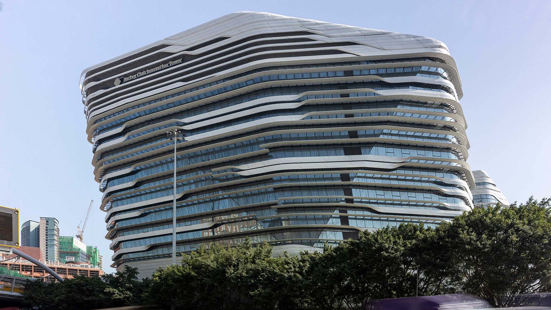 The Jockey Club Innovation Tower’s sinuous layers make it look like a spaceship