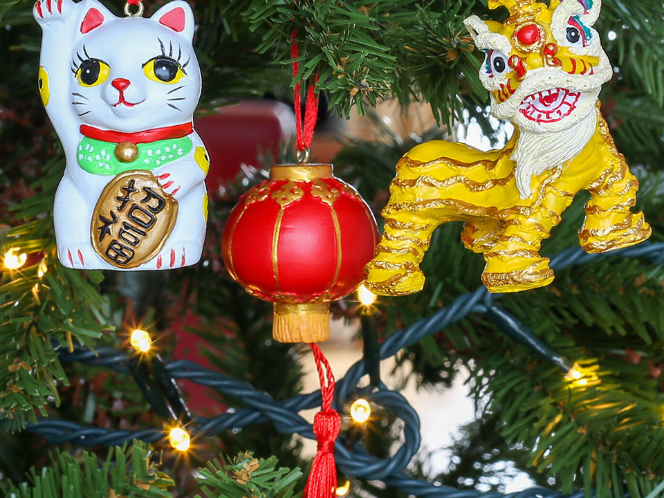 The Lion Rock Press festive ornaments on a Christmas tree