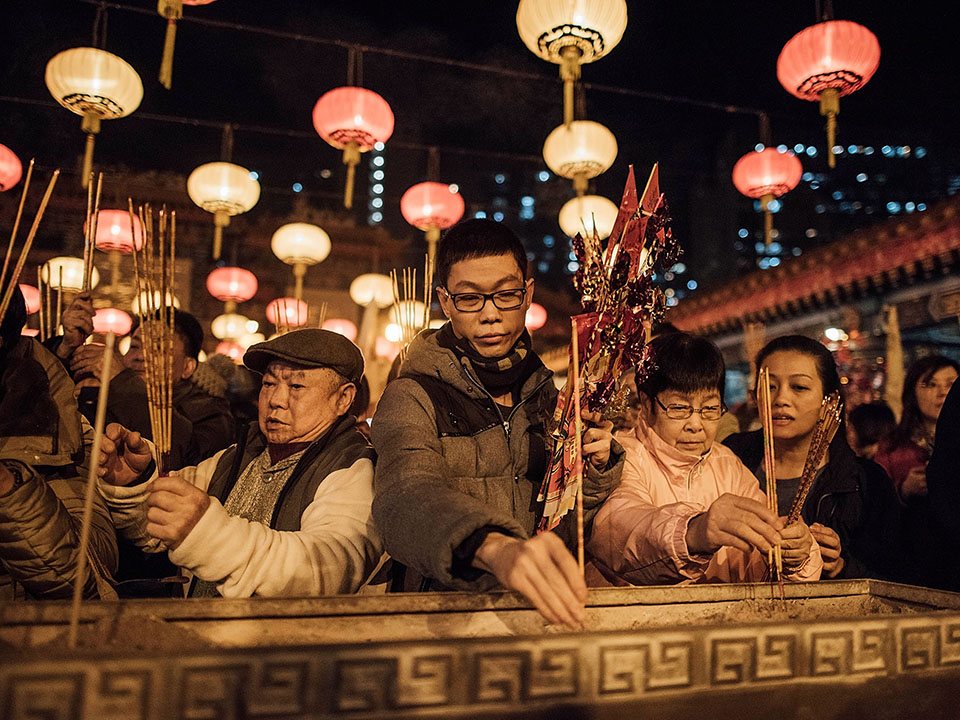 At midnight on New Year’s Day, worshippers at Wong Tai Sin Temple hope to offer the first incense stick.