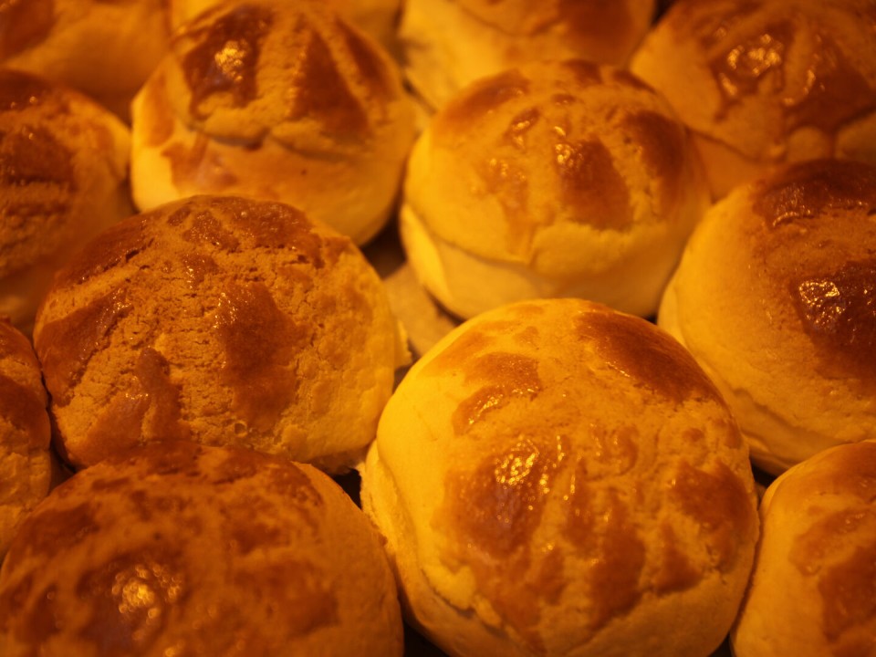 Freshly baked golden pineapple buns.