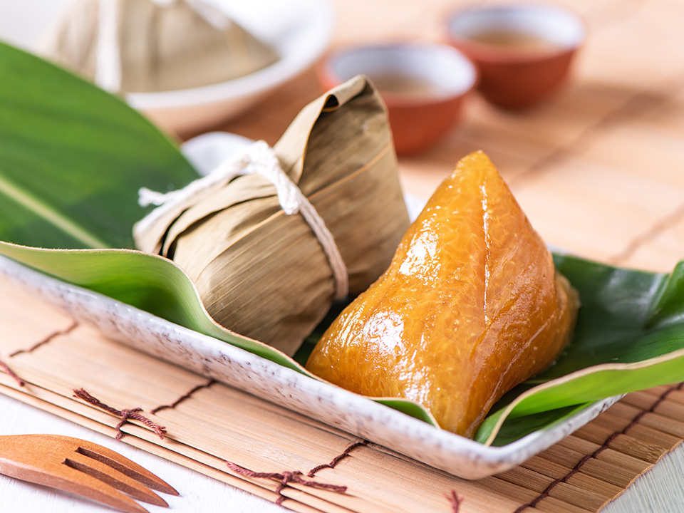 Alkaline zongzi is often enjoyed with white sugar or honey