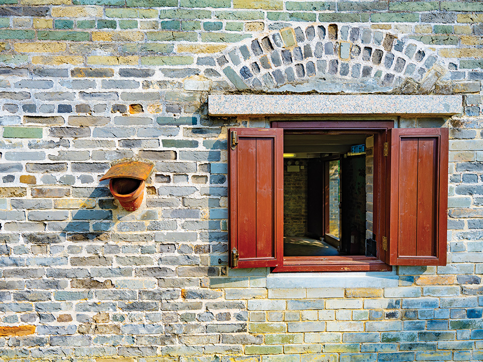 Red Window on the Wall of Fortified Structure