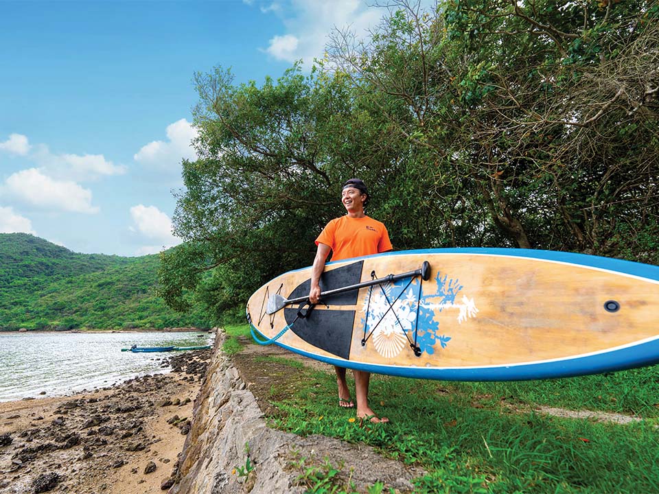 Edmund with his paddleboard