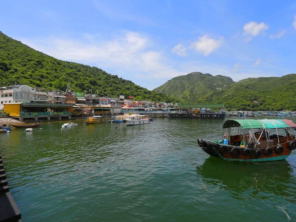 Experience fishing villages, temples, beaches, cafes and bars on a Lamma Island hike