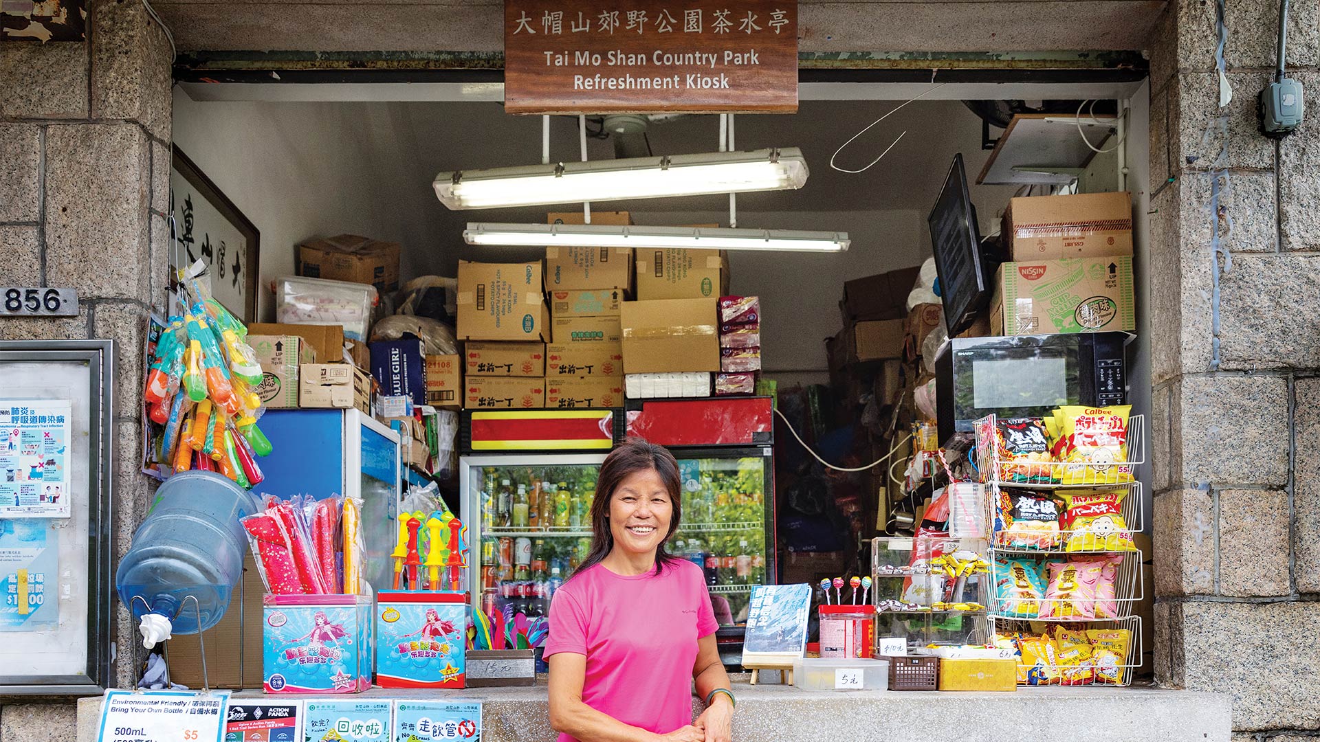 Lin Jei in front of her refreshment kiosk