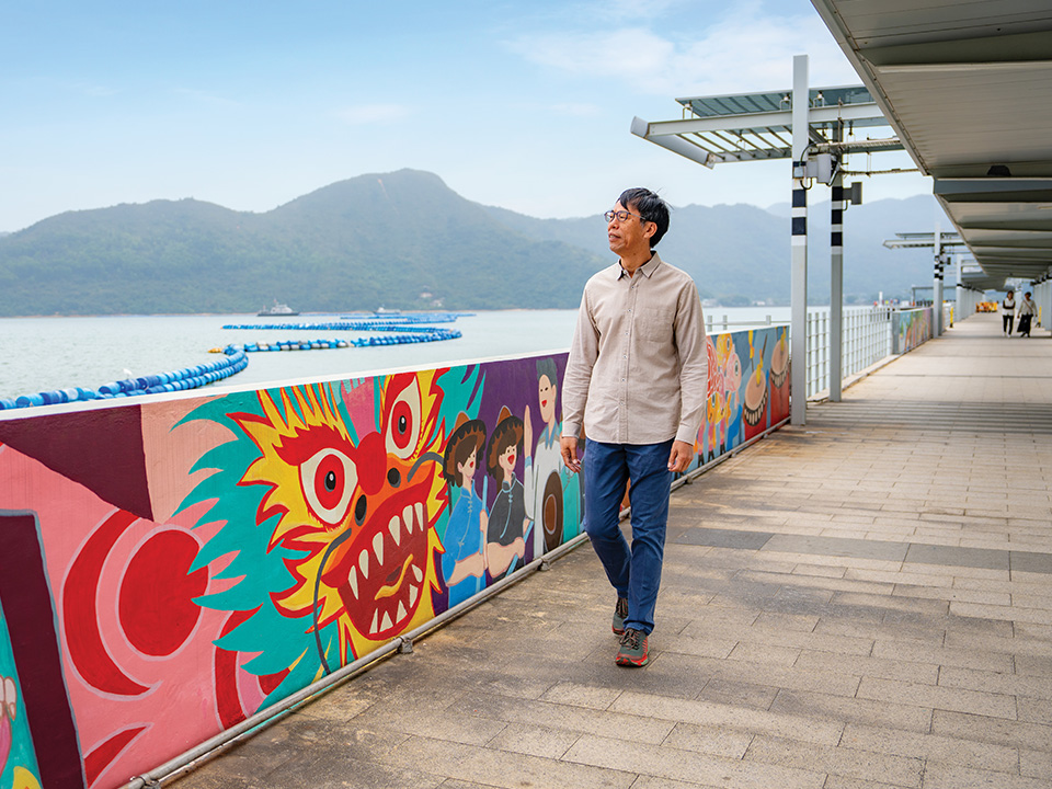 Lee taking a stroll along the Sha Tau Kok Pier, the longest pier in Hong Kong.