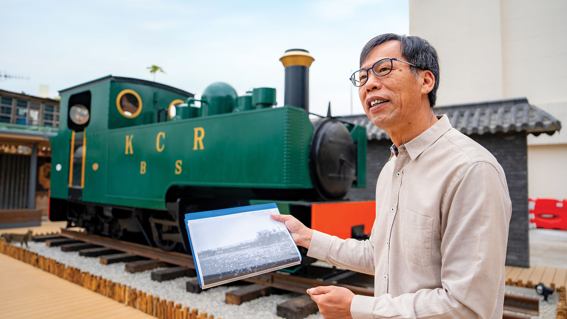 Lee introducing the story behind the remnants of the original Kowloon-Canton Railway steam trains.