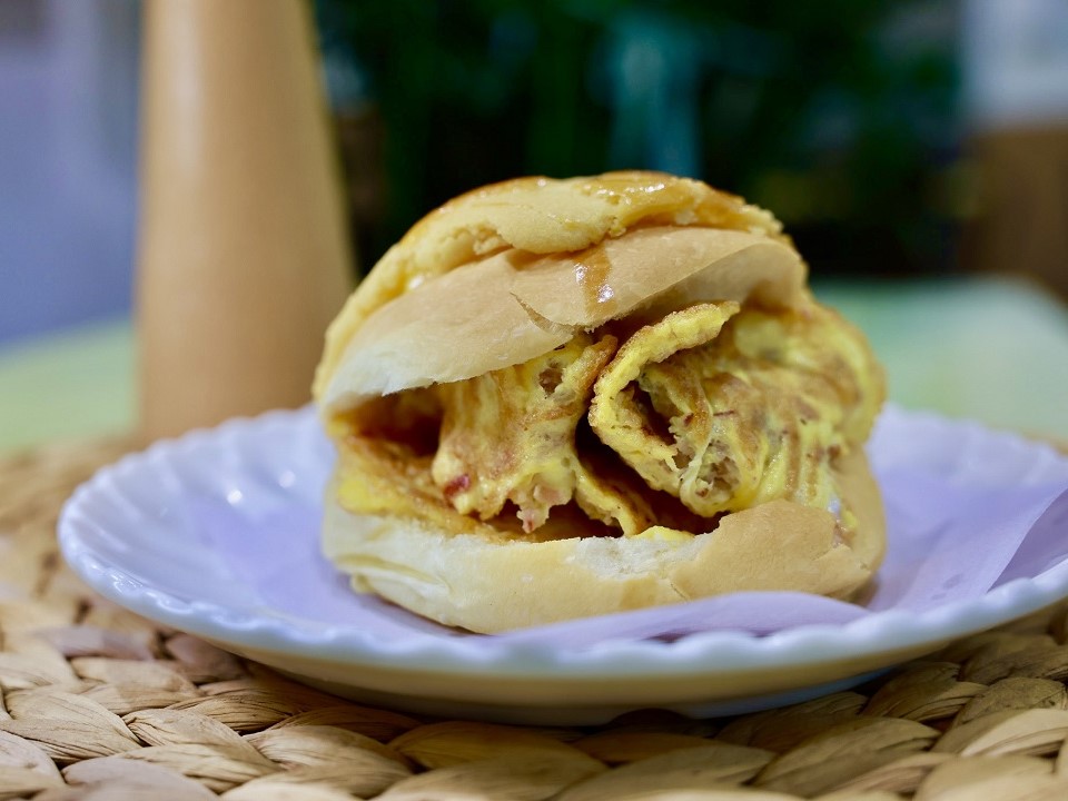 Pineapple Bun with Corned Beef and Fried Eggs