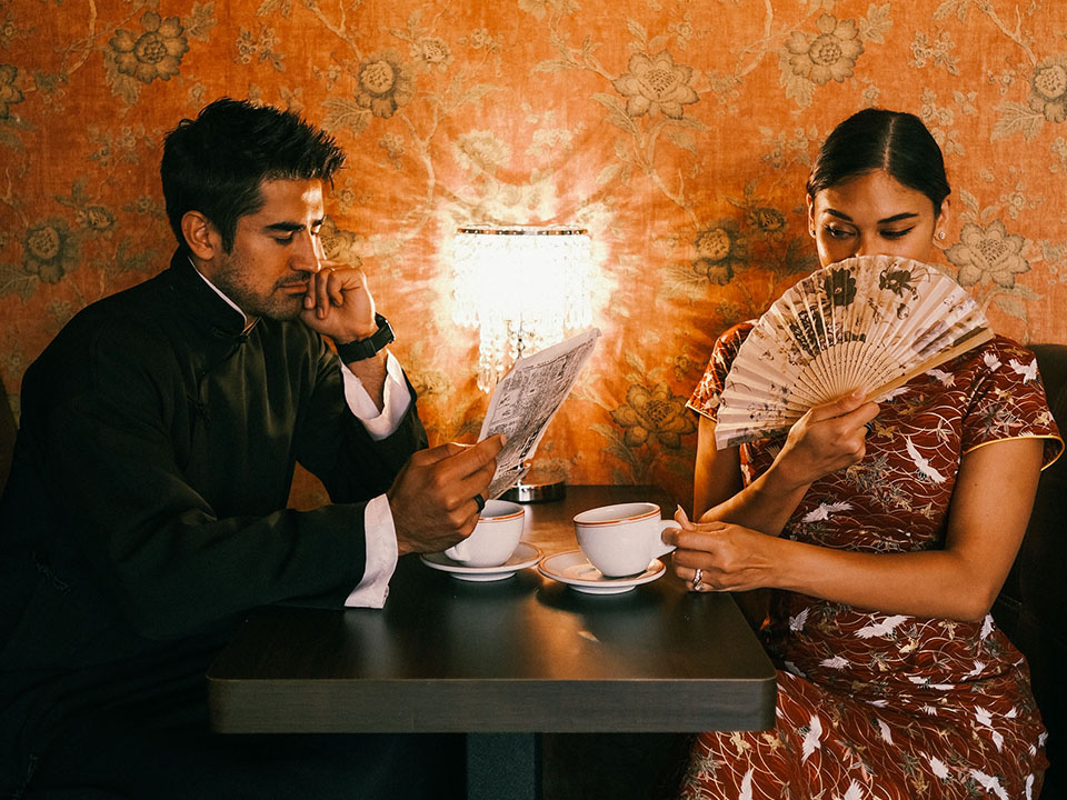 Pia and Jeremy Jauncey in traditional qipao and Tang suit